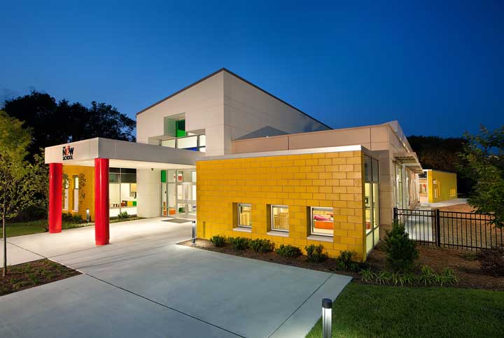 Exterior of The New E3 school at dusk